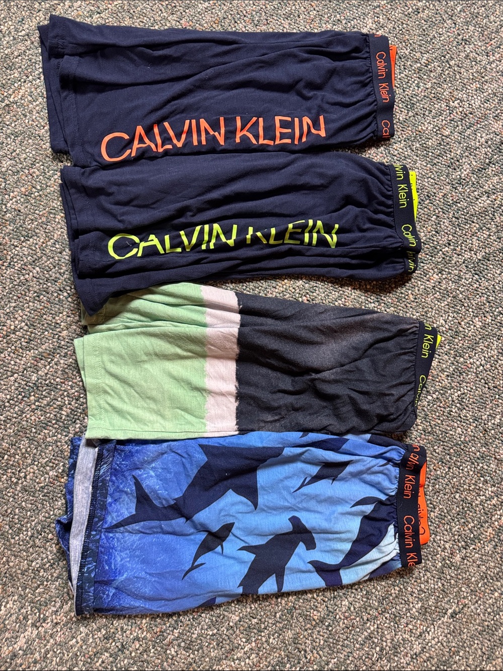 Calvin Klein Boys' Navy Sleep Shorts with Neon Logo Accents and Shark Print